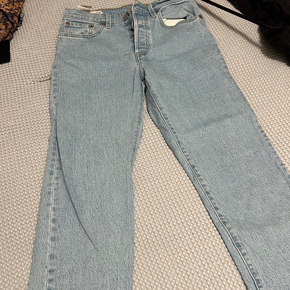 Levi size 27 light diem straight leg jeans